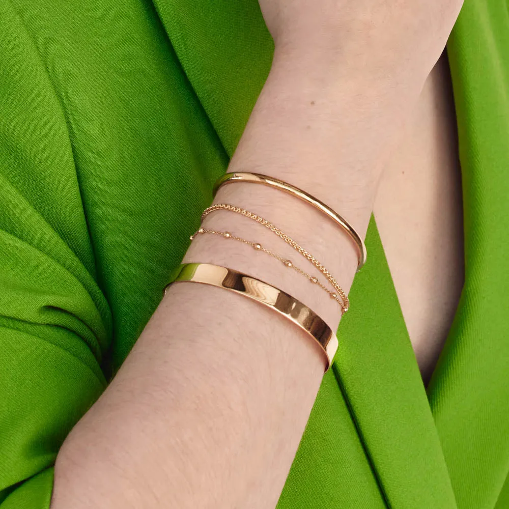 Curve Bangle in Gold