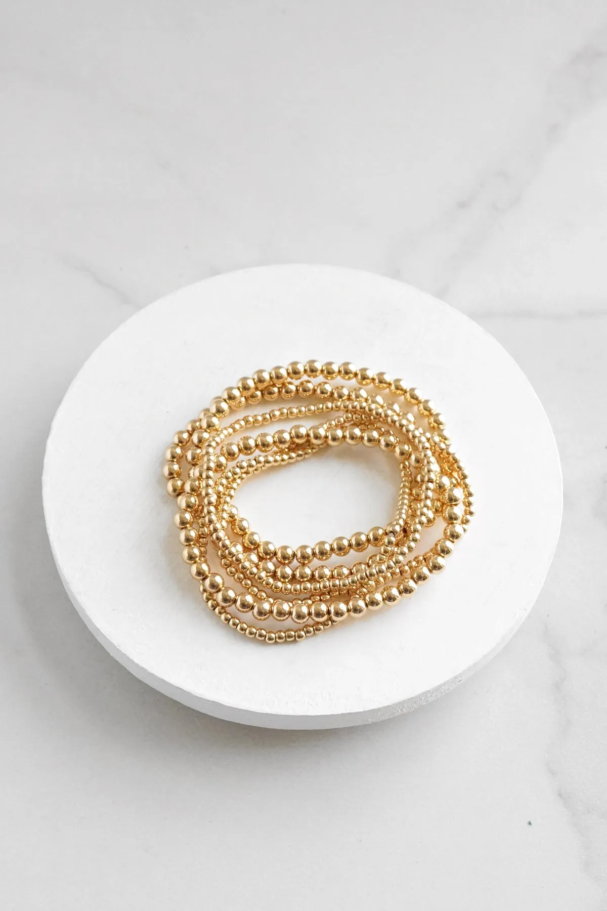 Gold tone multi size beaded bracelet stack of 6 bracelets