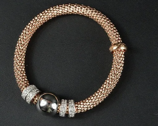 Rose Gold Plated Silver Beaded Stretch Bracelet with multiple Rows of Cubic Zirconia Rings 19cm long - Ceilo Milan