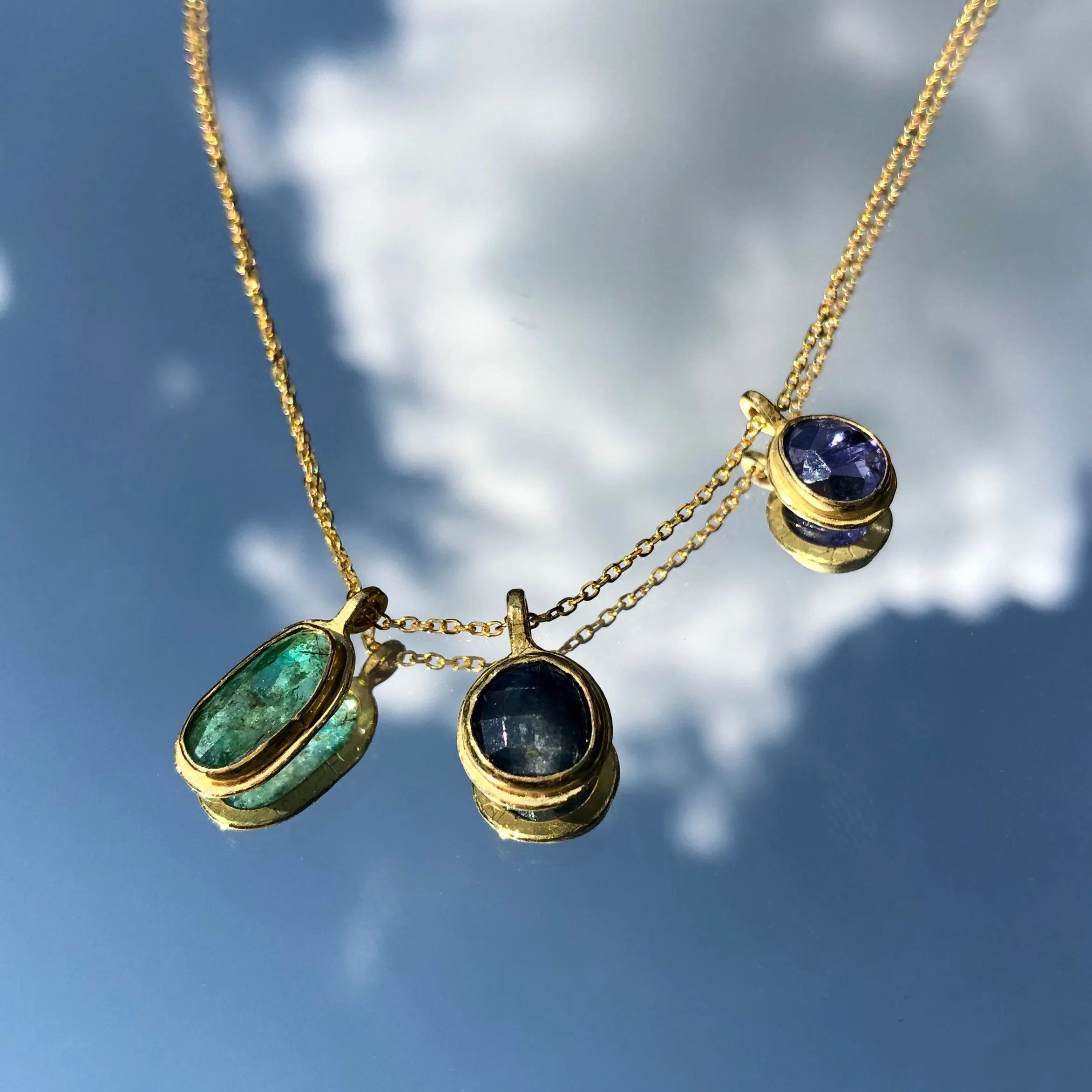 Sapphire & 18k pendant