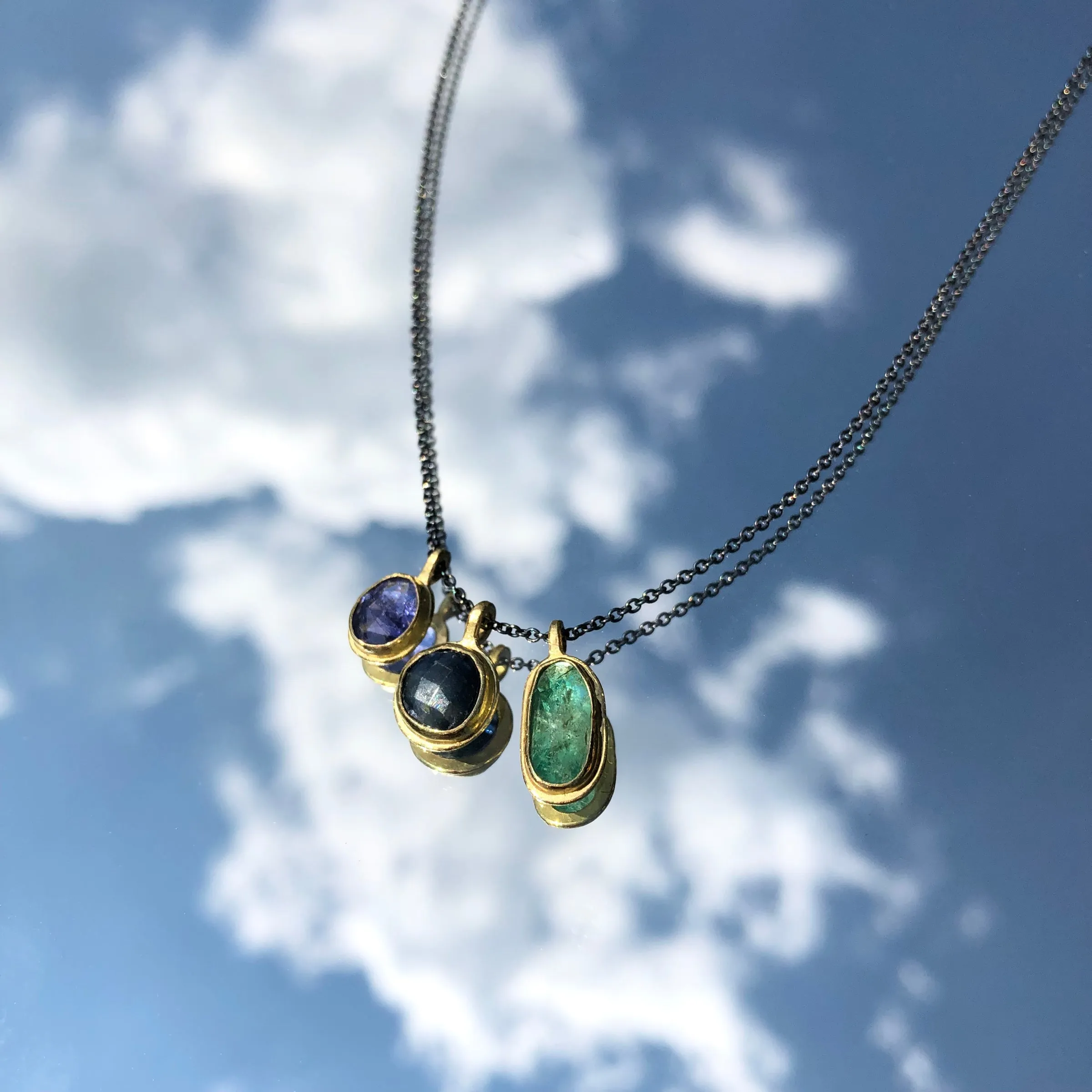 Sapphire & 18k pendant