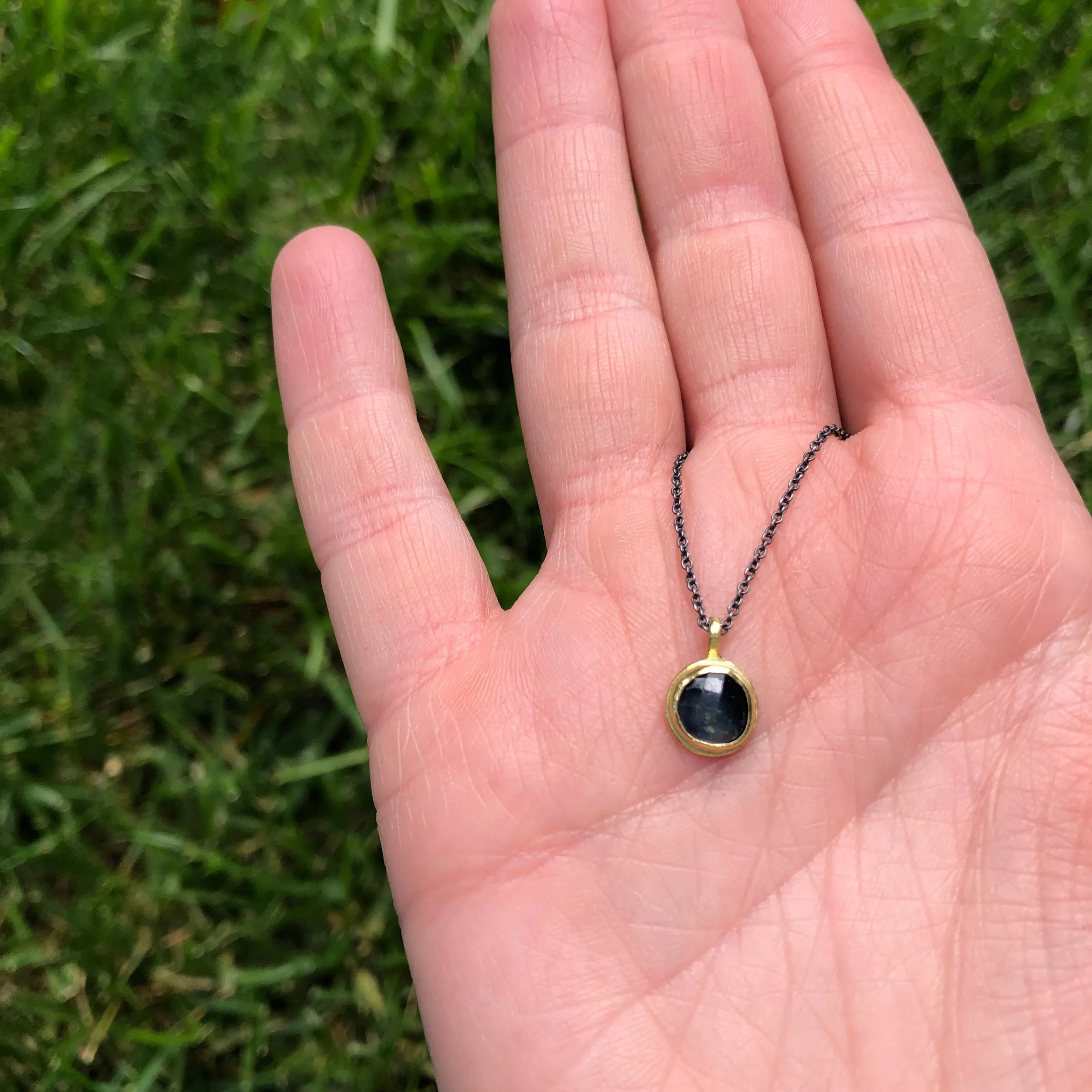 Sapphire & 18k pendant