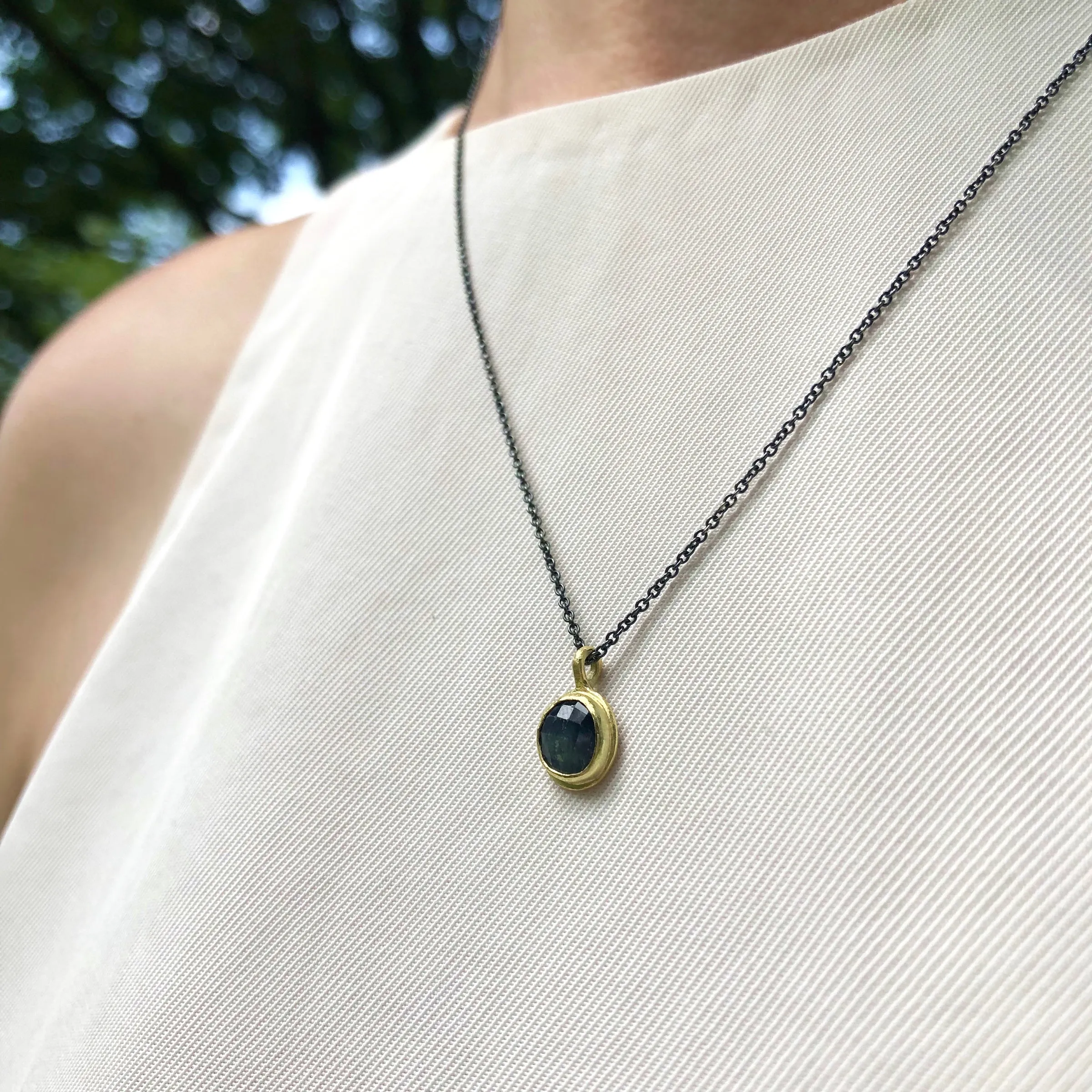 Sapphire & 18k pendant