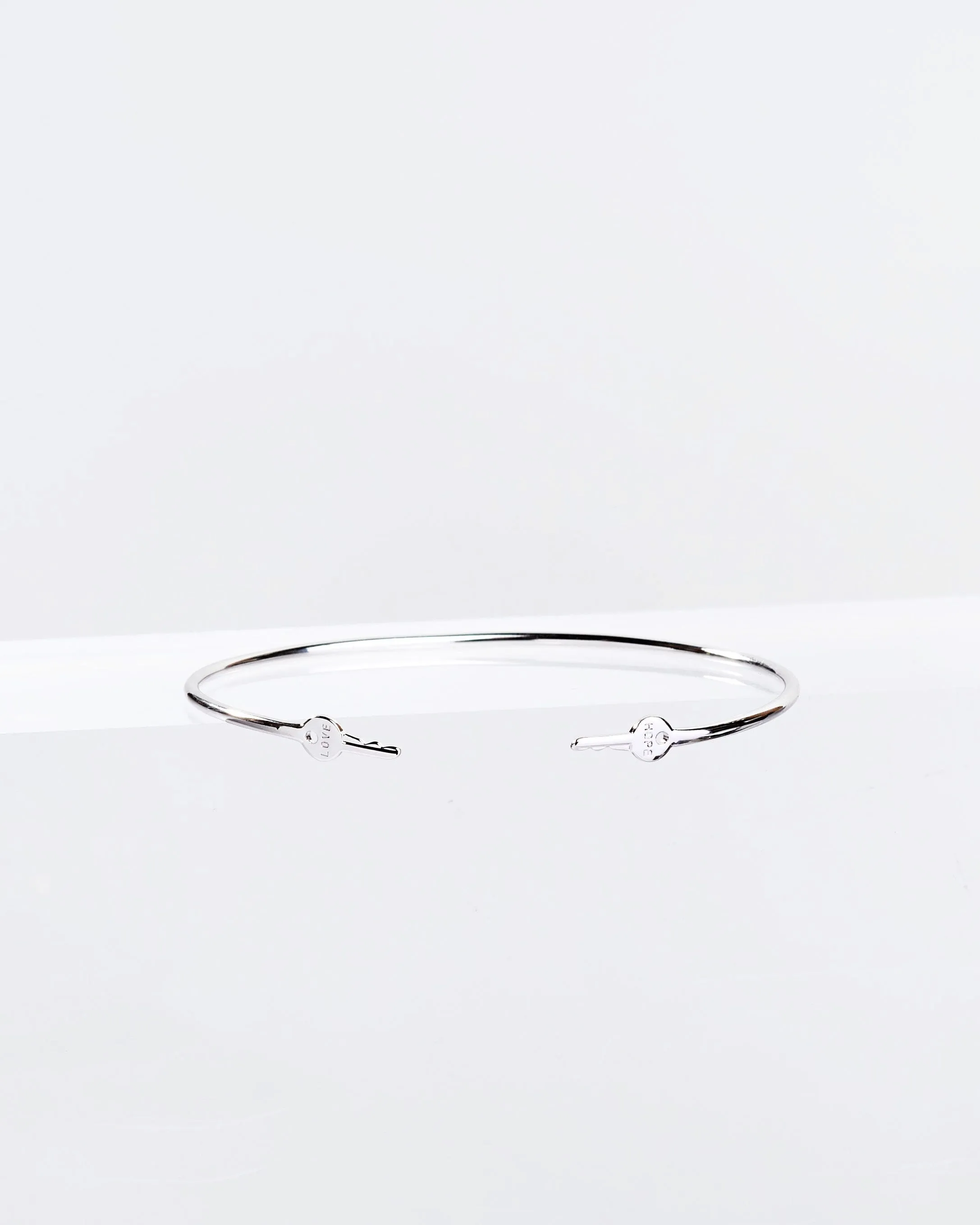 Silver Wrapped Mini Key Bangle