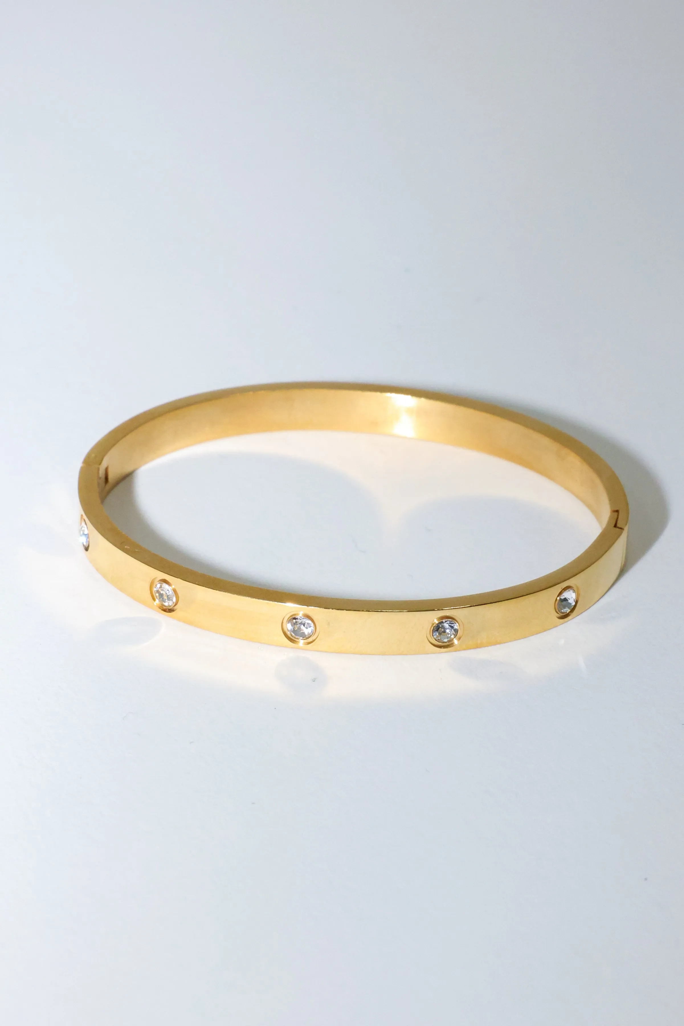 Thick Gold Toned and Crystal Bangle