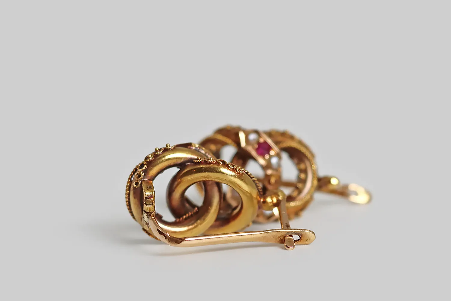 Victorian Era Etruscan Revival Joined Rings Earrings with Ruby & Pearl in 14k Gold